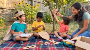 Try the Weekend imagination challenge create your own hero. In a short family session, children invent a name, look, and one kind act. Simple, playful steps build empathy, language, and confidence.