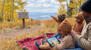 A warm, short guide to America the Beautiful for kids. Learn the poem's mountain origin, the tune's history, a quick timeline, calm listening tips, and two playful activities for families and teachers.